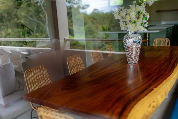 Natural wood dining table at villa caimito