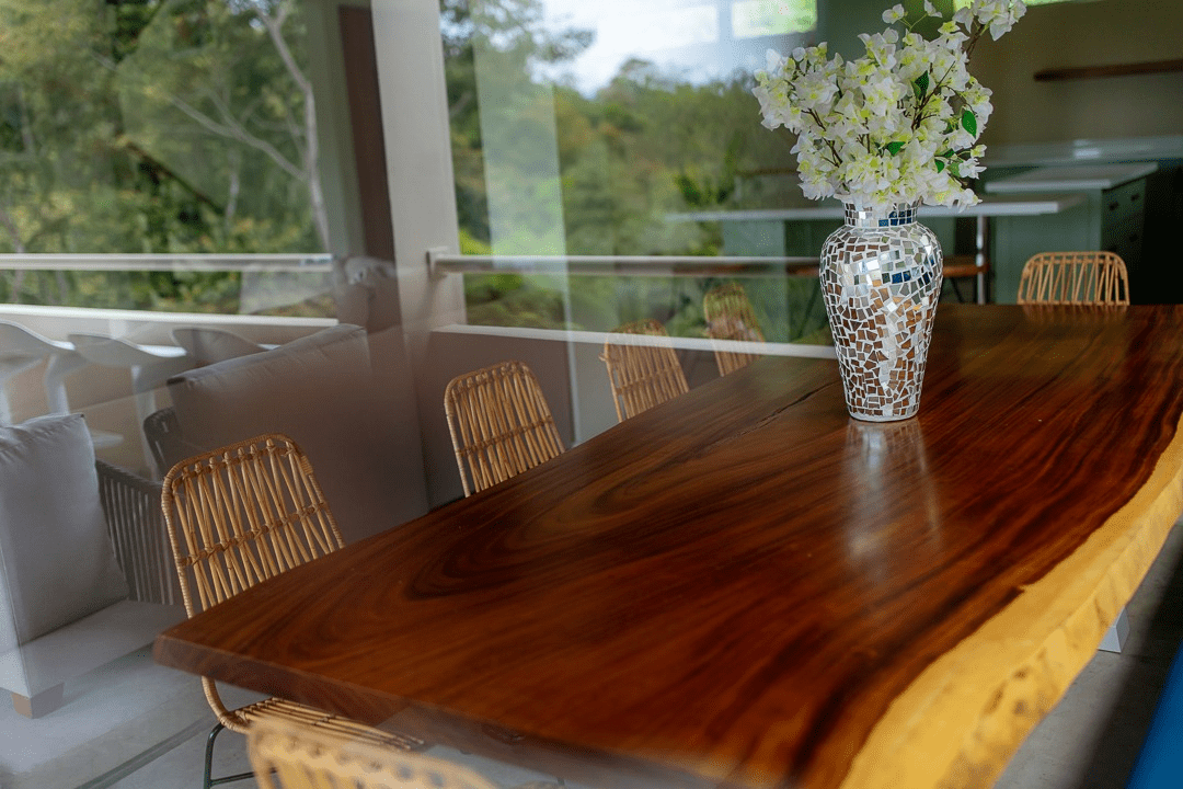Natural wood custom made dining table for beach villa in Manuel Antonio