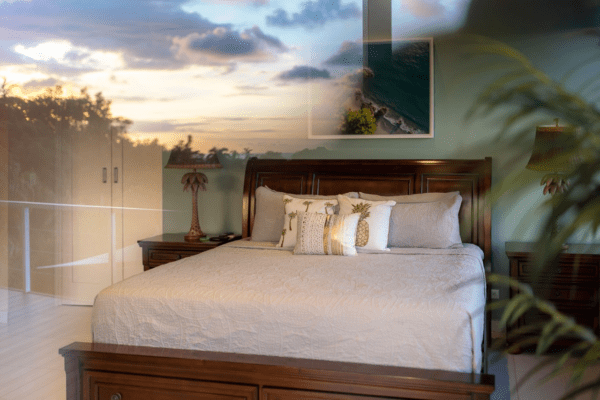 Master bedroom interior design with reflection of the Costa Rican sunset