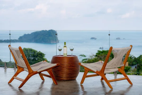 chairs set with ocean view at Villa costa vida terrace